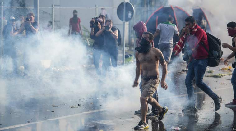Migrants clashed with Hungarian police