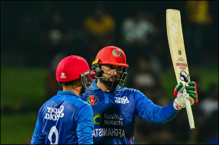 নবি-ওমরজাইয়ের ব্যাটে চূর্ণ হল ক্রিকেটের দুই যুগের রেকর্ড!
